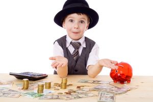 5 trucuri prin care sa il inveti pe copil sa economiseasca